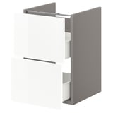 An ENHET white bathroom cabinet with two drawers. It has a modern, glossy finish and is 40 cm wide.