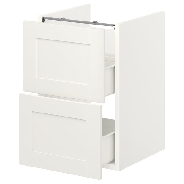 White ENHET bathroom cabinet with two drawers, rectangular shape, and sleek design.