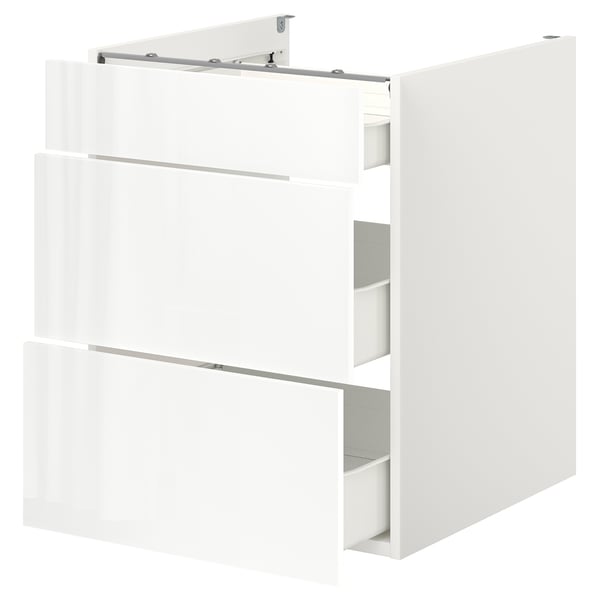 A white ENHET kitchen cabinet with three drawers. It a sleek, modern design with glossy surfaces and minimalist style.