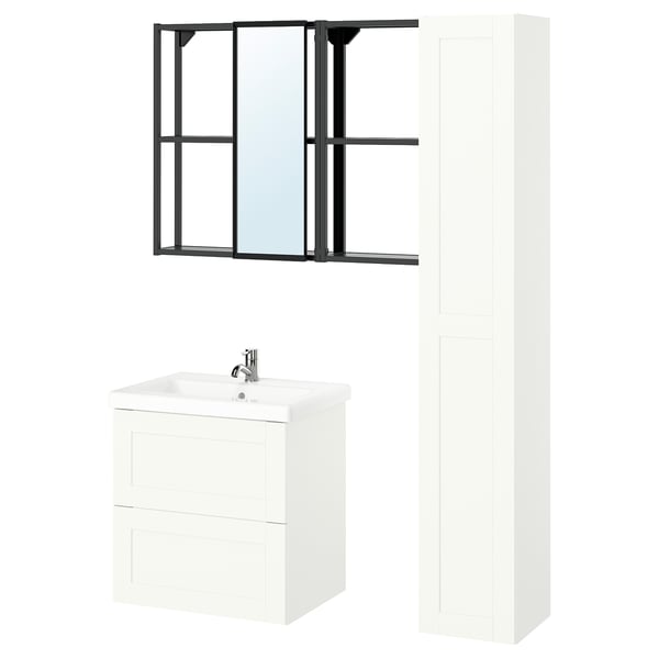 Modern bathroom setup: ENHET. White vanity, tall cabinet, black mirror frame.