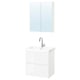 White ENHET bathroom setup: glossy white vanity with sink, chrome faucet, and mirrored cabinet.
