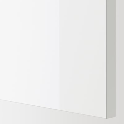 White glossy kitchen cabinet with smooth, clean surface and seamless design.