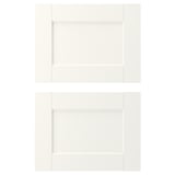 Two white ENHET drawer fronts, each with a wide frame, adding a modern touch.