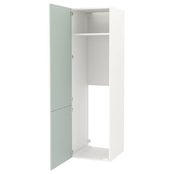 Ikea ENHET white cabinet with light green door open, showing empty shelves.