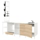 The ENHET kitchen set a white and light wood color scheme with modern design, including a counter with a sink and storage units.
