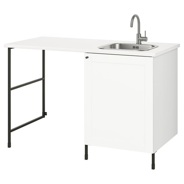 A white ENHET laundry unit with a sink, featuring a modern design with stainless steel accents.