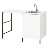 A white ENHET laundry unit with a sink, featuring a modern design with stainless steel accents.