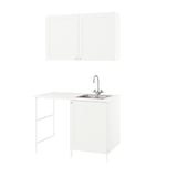 Modern white laundry unit: ENHET with sink and storage.