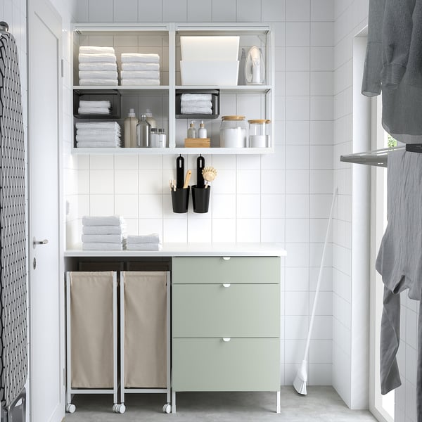 Modern bathroom storage: ENHET, light green, metal & wood, cabinet & shelves, towels & bottles.