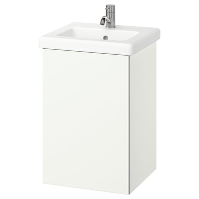 A white ENHET bathroom vanity cabinet with a ceramic sink and chrome faucet. Its sleek and wall-mounted, perfect for small bathrooms.