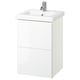 White ENHET bathroom vanity, rectangular with two drawers, ceramic sink, chrome faucet.