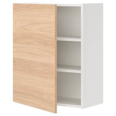 An ENHET wall cabinet in light oak and white. It has a sleek, rectangular shape with a single door and two shelves inside for storage.