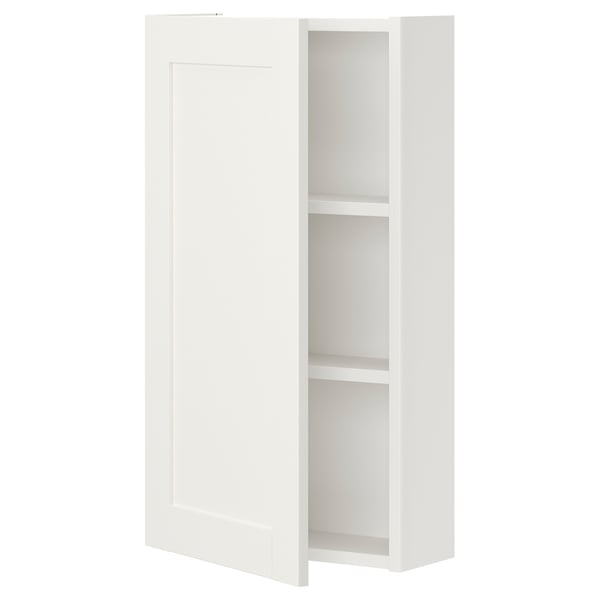 White ENHET wall cabinet with two shelves and single door. 10-year guarantee.