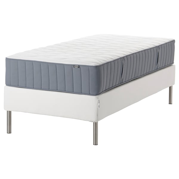Espevar/vagstranda foam mattress in white/blue on white base with silver legs.