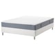 Option: White and gray rolled mattress on white bed frame.