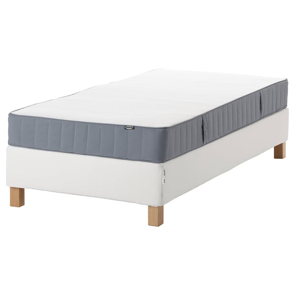 IKEA espevar mattress on white frame. Gray cover, bonnell springs, smooth fabric.