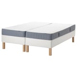 White/blue mattresses on wooden legs. Split design, great for separate sleep.