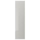 A sleek, vertical FARDAL door in high-gloss white. It’s rectangular with rounded edges and a modern design.