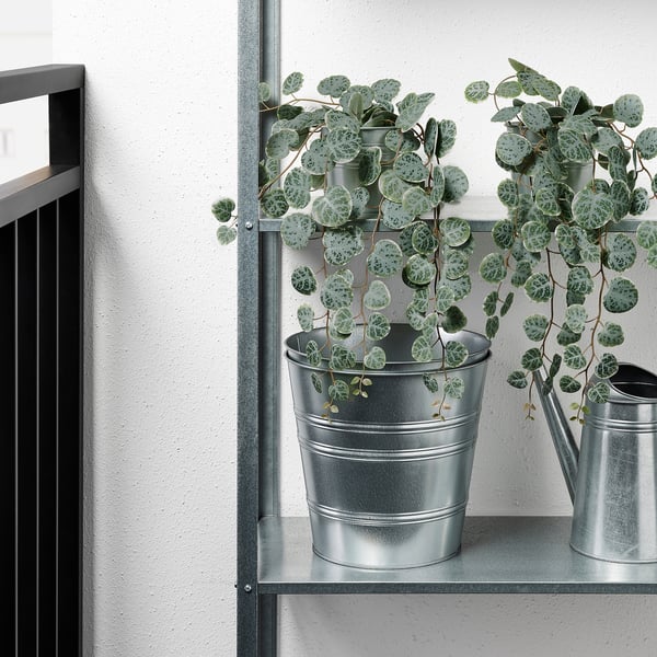 Metal shelf with two artificial plants in galvanized pots, one watering can. Perfect for both indoor and outdoor use.