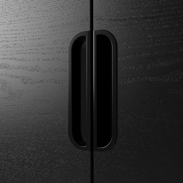Black cabinet with sleek handle. Modern design, quality finish.