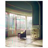 Chair with colorful ribbons, large windows, arched green ceiling, fireplace, and glass cabinet.