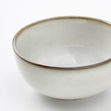 Smooth glazed stoneware bowl.