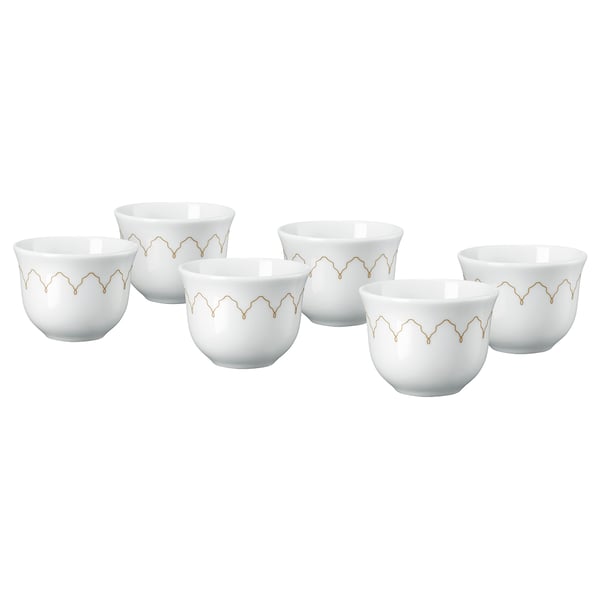 Five white porcelain cups with golden zigzag design arranged in a row.