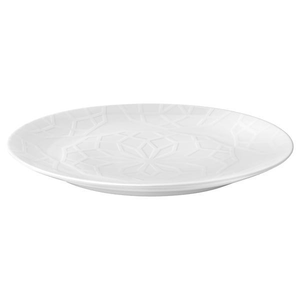 White, round ceramic plate with embossed geometric design. Elegant and textured surface, durable and dishwasher safe.