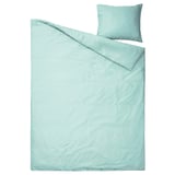 Light turquoise bedding set with silky lyocell duvet and pillow in solid color with elegant piping.