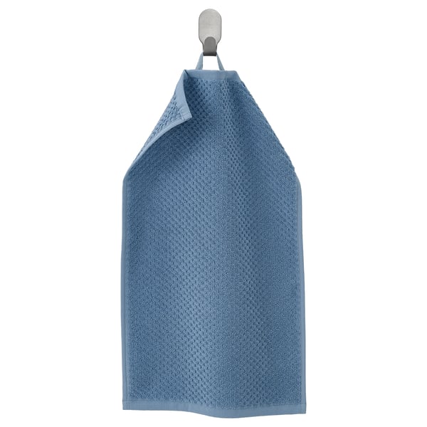 GULVIAL blue towel, soft & fluffy, hangs on hook.