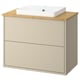 Havbaeck bathroom unit: cream cabinet, bamboo top, rectangular sink.