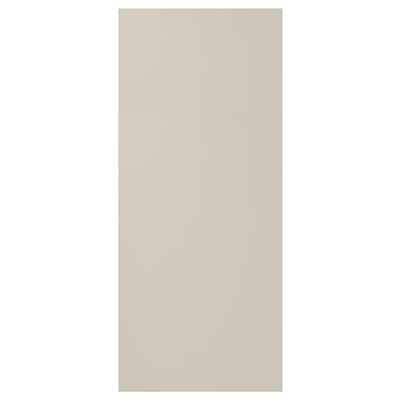 A beige HAVSTORP cabinet door with clean lines. Its rectangular and made of acrylic paint and fiberboard.