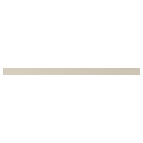 A beige kitchen cabinet front called HAVSTORP, known for its smooth, modern design.
