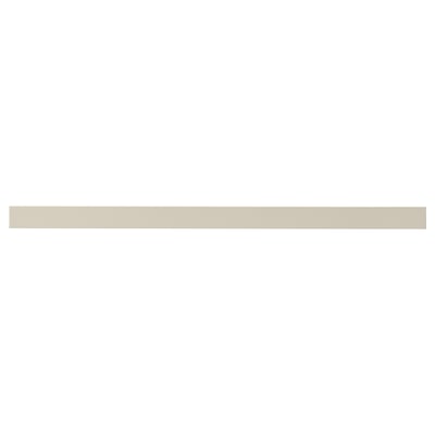A beige kitchen cabinet front called HAVSTORP, known for its smooth, modern design.