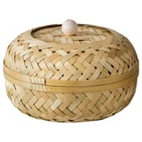 Elegant woven bamboo basket with lid. Handcrafted herringbone design. Natural color, round shape, decorative.