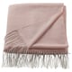 Light pink HOLMVI throw blanket, soft, rectangular with fringe edges, made from recycled polyester.
