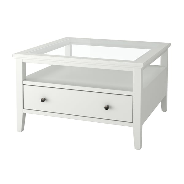 White IDANÄS glass-topped coffee table with wooden frame and drawer.