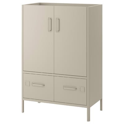 A light beige IDÅSEN cabinet with two doors and two drawers, metal handles. Its rectangular, with clean lines and a minimalist design.