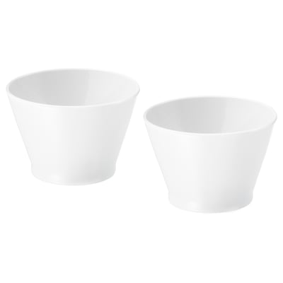 Two white ceramic bowls, one slightly larger than the other, simple design, stackable, plain interior and exterior.