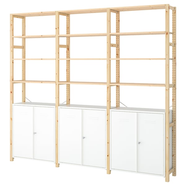 Light wood IVAR unit, white cabinets, upright shelves, natural wood grain.