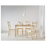Simple light wooden dining set, including table and four chairs. Minimal design with light-colored wooden elements.