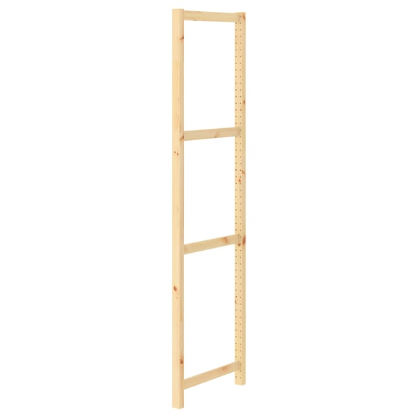 IVAR wooden shelf unit in natural finish. Rectangular design with vertical slats and pegboard style holes. Made from solid pine.