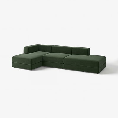 Modern dark green l-shaped sofa with square cushions and clean lines.