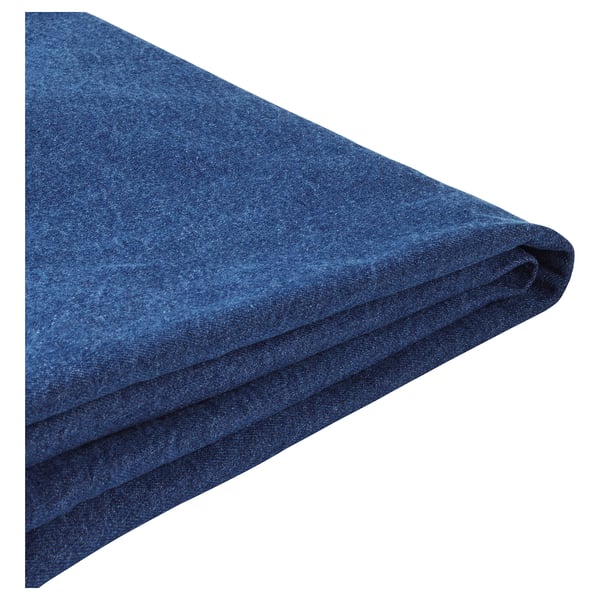 Blue denim sofa cover, folded neatly. Recycled cotton material, practical pocket design.