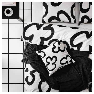 KLIPPBRÄCKA pillow: square, white & black, recycled cotton & polyester, bold abstract shapes.