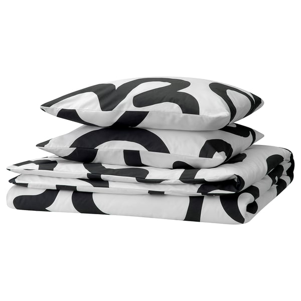 KLIPPBRÄCKA bedding set: folded black & white patterned duvet cover with pillowcases. Modern design, 80% cotton, 20% viscose.