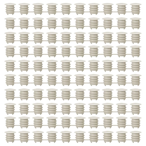Grid of white KOMPLEMENT plastic furniture cover caps, uniformly shaped and aligned.