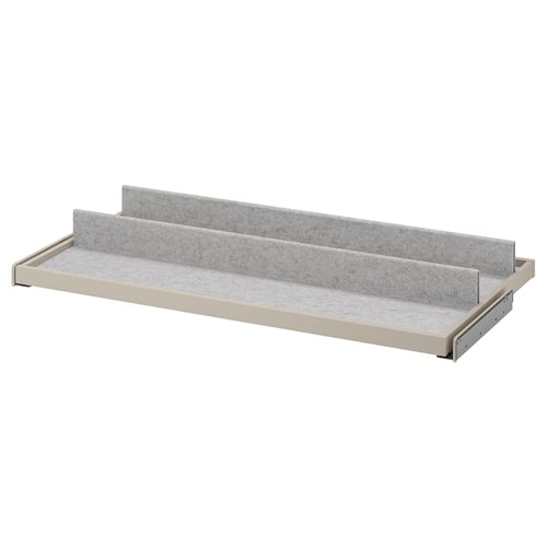 A KOMPLEMENT grey pull-out tray shelf with felt lining, perfect for organising items.
