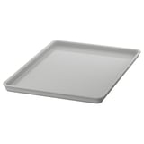 A KUGGIS plastic lid, white, rectangular, with smooth design.