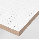 Stack of white sheets with gray dot grid patterns visible, showing high-quality, smooth paper with clean edges.